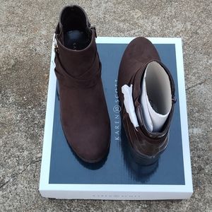 Brown women ankle high boots.